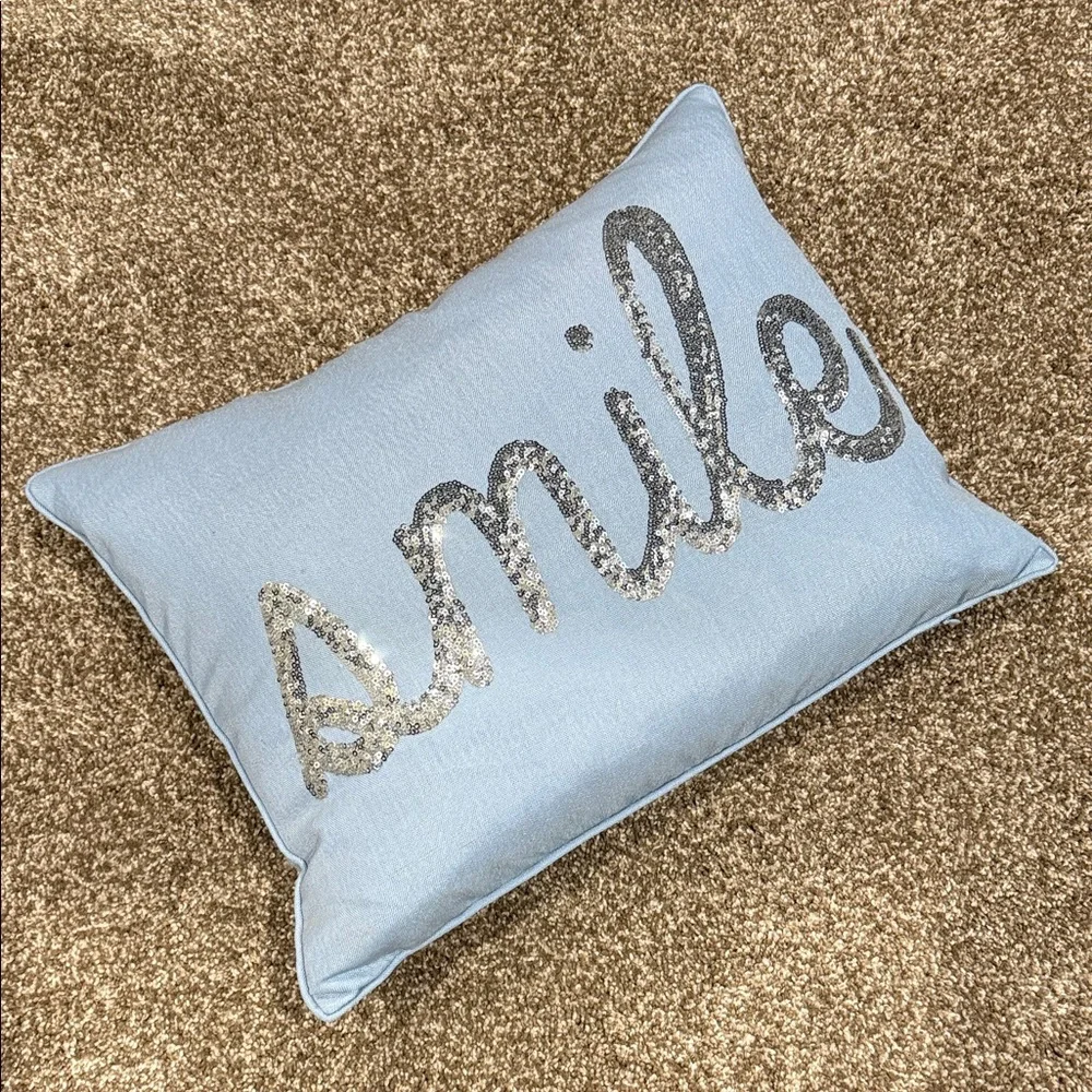 Blue Decorative Pillow with Silver 'Smile' Design